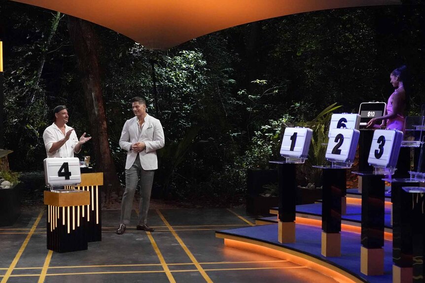 Rob Mariano, Joe Manganiello, and Kamari Love choose briefcases in Deal or No Deal Island Episode 104.