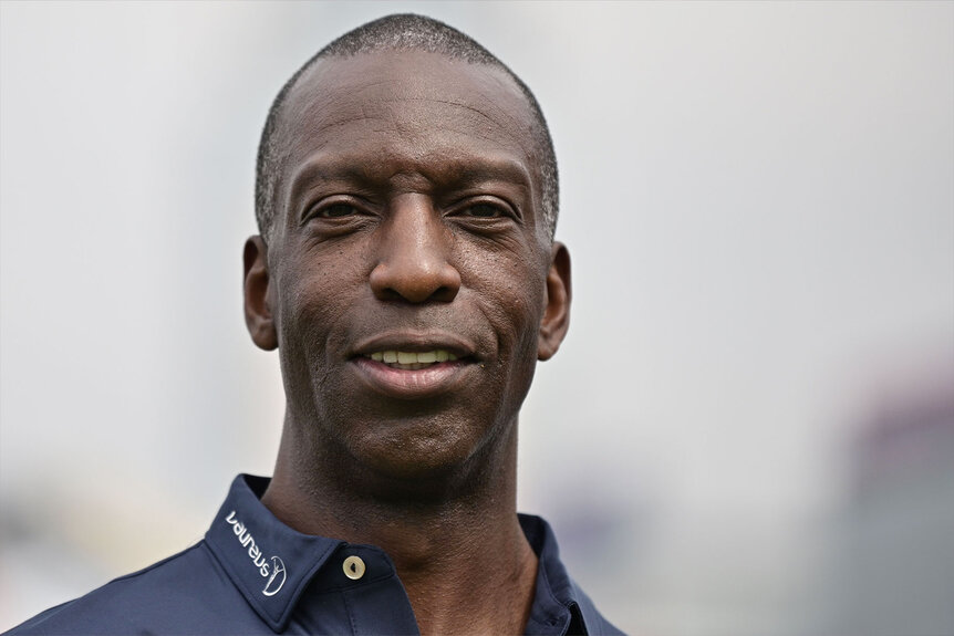 Michael Johnson poses as he attends a promotional event ahead of the Hong Kong Rugby Sevens tournament.