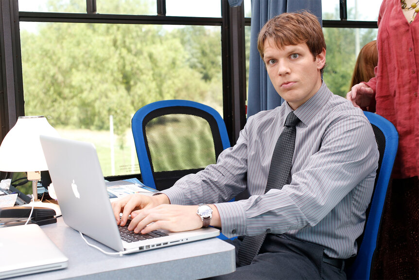 Pete on The Office typing on a computer