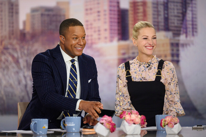 Craig Melvin and his wife Lindsay Czarniak pose for a photo together