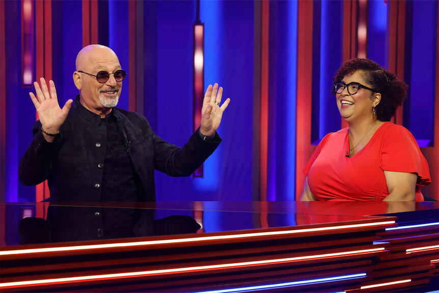 Howie Mandel and a contestant appear on Password Season 2 Episode 7.