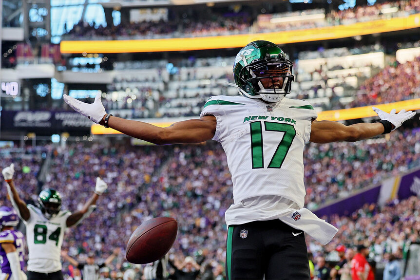 Garrett Wilson of the New York Jets celebrates after a long gain