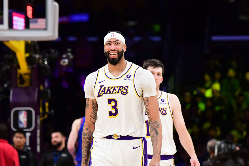 Anthony Davis smiles while on the court during a game