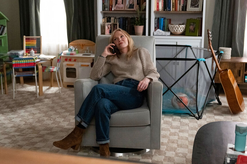 Detective Amanda Rollins sits in her living room in Law & Order: Special Victims Unity Season 25 Episode 11.