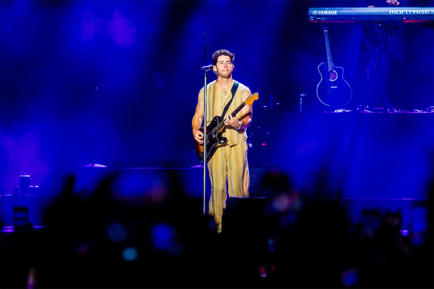 Nick Jonas performs onstage during a concert in Brazil