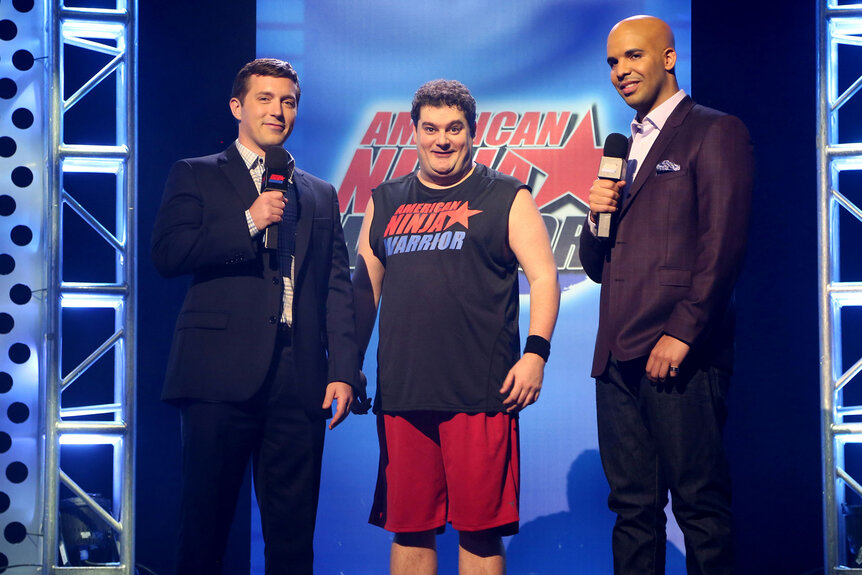 Beck Bennett as Matt Iseman, Bobby Moynihan as Jeff Metcalf, and Drake as Akbar Gbajabiamila during the "American Ninja Warrior" sketch