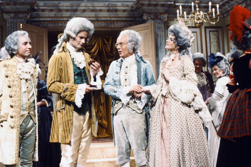 Harry Shearer as Lord Salisbury, Bill Murry as Earl of Sandwich, Buck Henry as Lord Douchebag, Gilda Radner as Lady Douchebag during "Lord & Lady Douchebag" skit on Saturday Night Live