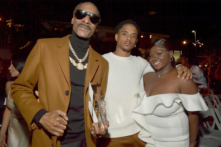 Snoop Dogg with his son Cordell and daughter Cori attend an event