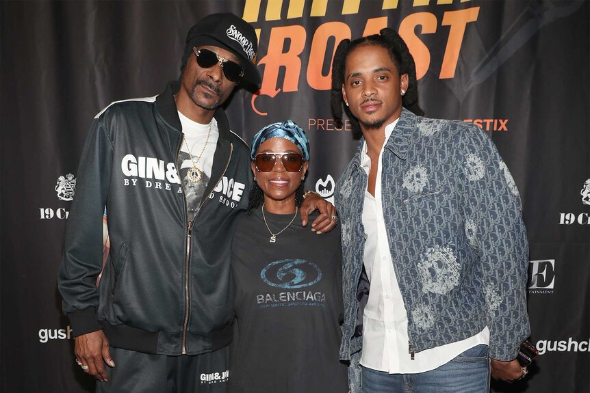 Snoop Dogg with his wife Shante and son Cordell attend the Rhythm & Roast Event