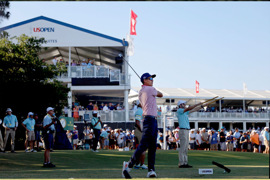 Crowds watch as Rickie Fowler, of Murrieta, follows through on the 11th hole tee during Round 3 of the 2023 US Open of Golf