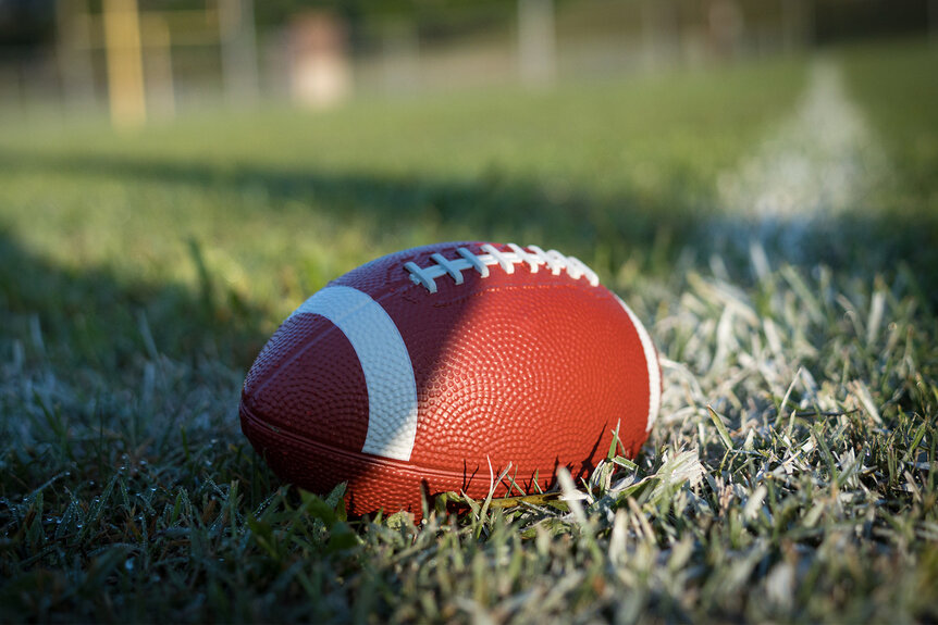 Football sitting on a field