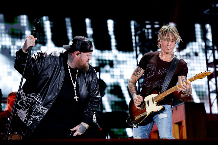 Jelly Roll and Keith Urban perform onstage during the 2024 CMA Music festival