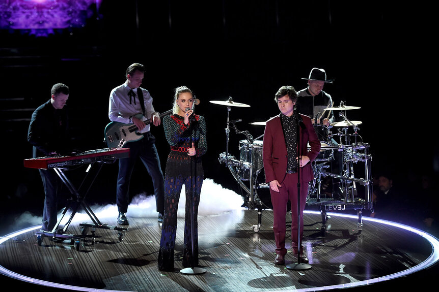 Kelsea Ballerini and Lukas Graham music group members perform during The 59th GRAMMY Awards