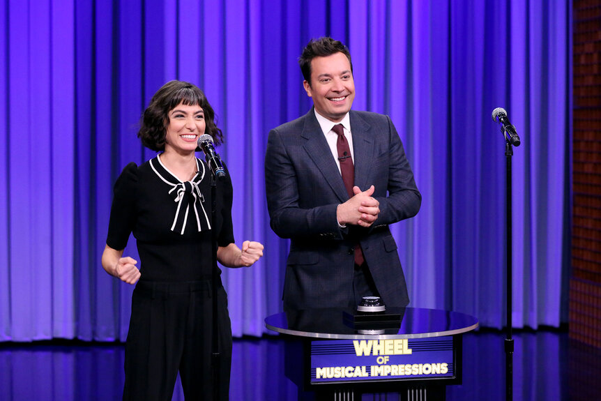 Melissa Villaseñor with host Jimmy Fallon during "Wheel of Musical Impressions"