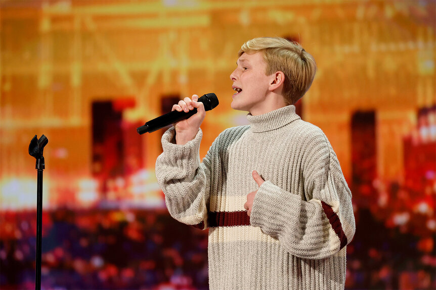 Reid Wilson performs on stage on America's Got Talent Episode 1906