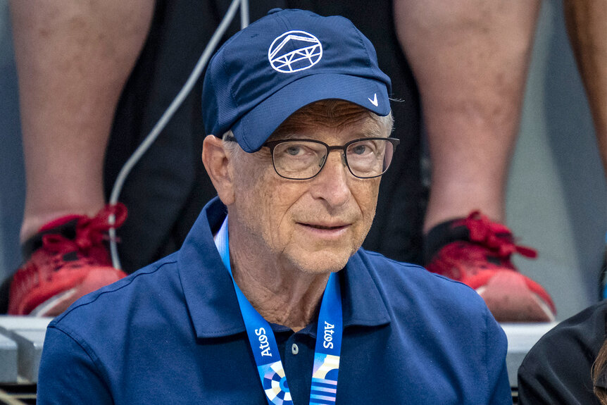 Bill Gates watches tennis at the 2024 olympics