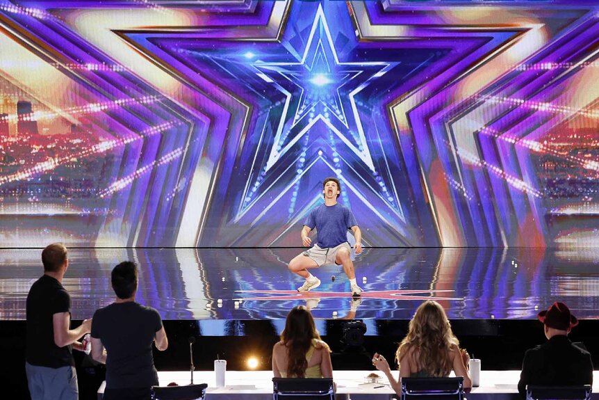 Insane Shane performs onstage on America's Got Talent Episode 1907.