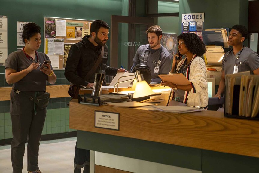 The cast of Brilliant Minds convenes in a hospital in Episode 101.