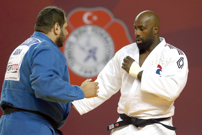 Teddy Riner fights against Brazil's Rafael Silva (Blue) in the Men's +100kg round of Quarter-Final match