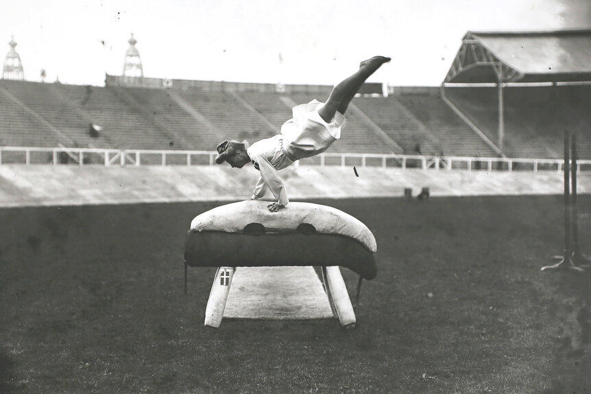 A gymnast during the 1908 on the pommel horse