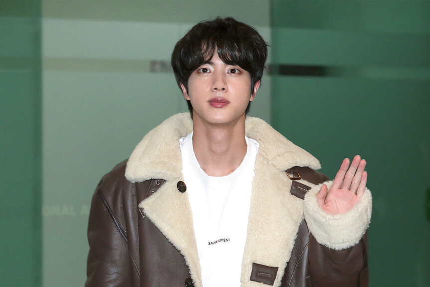 Jin of boy band BTS is seen on departure at Gimpo International Airport