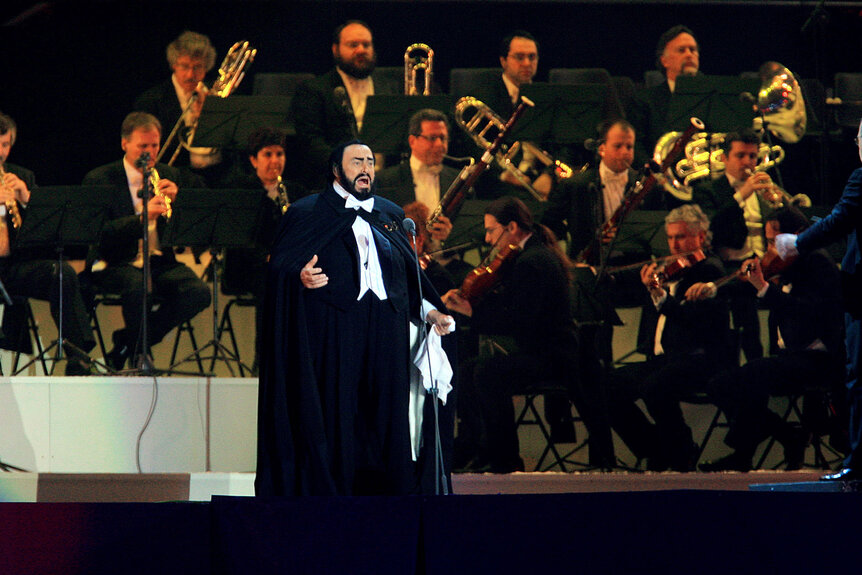 Luciano Pavarotti performs during the opening ceremony of the 2006 Winter Olympics