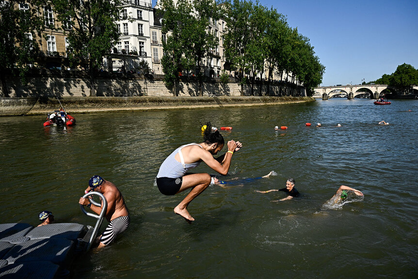 Parisians swimming in the Seine river.