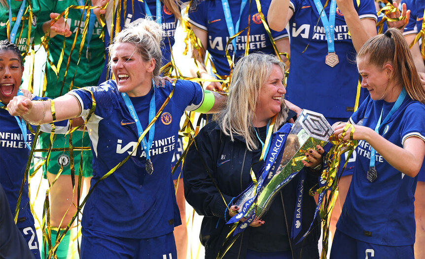 Millie Bright and Emma Hayes with the trophy during a Barclays Women's Super League match