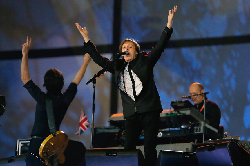 Sir Paul McCartney sings on stage during the opening ceremony of the 2012 london olympics