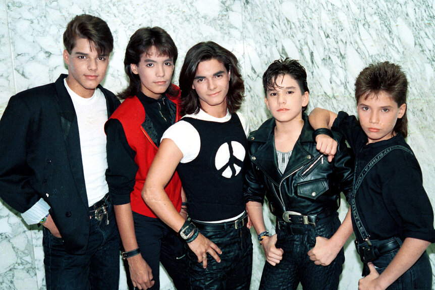 Ricky Martin & Menudo pose together for a phto circa 1980