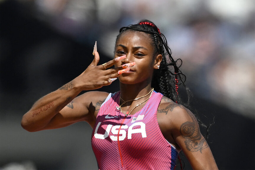 Sha'Carri Richardson blows a kiss after the women's 100m heats at the World Athletics Championships