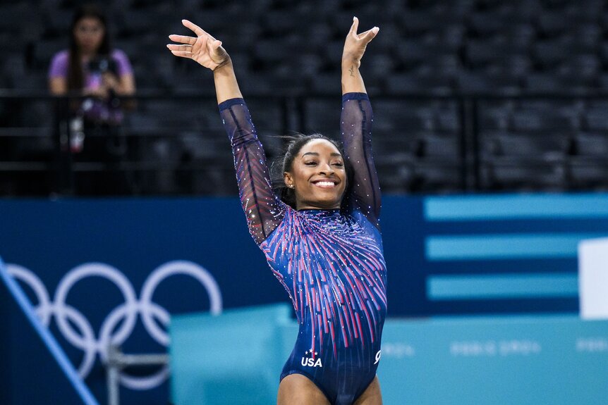 Simone Biles does a salute at the Paris 2024 Olympics.