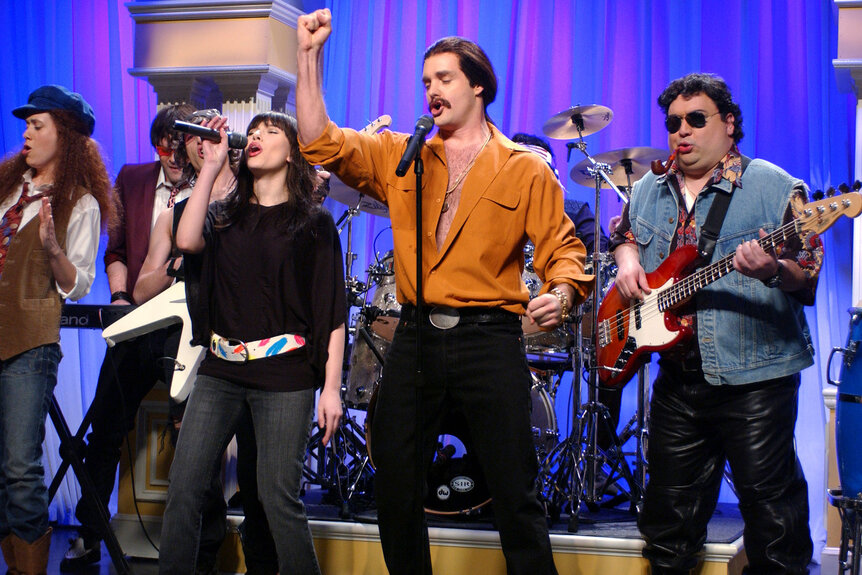 Kristen Wiig, Scarlett Johansson as Char Hamrlik, Will Forte, and Horatio Sanz during "Duluth Live" skit on Saturday Night Live on January 14, 2005.