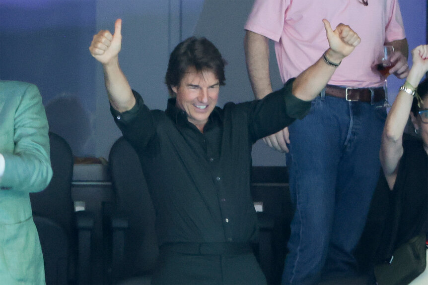 Tom Cruise cheers at the 2024 Paris Olympics