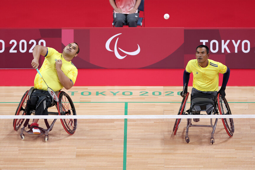 Jakarin Homhual and Dumnern Junthong during a volley during a Badminton competition