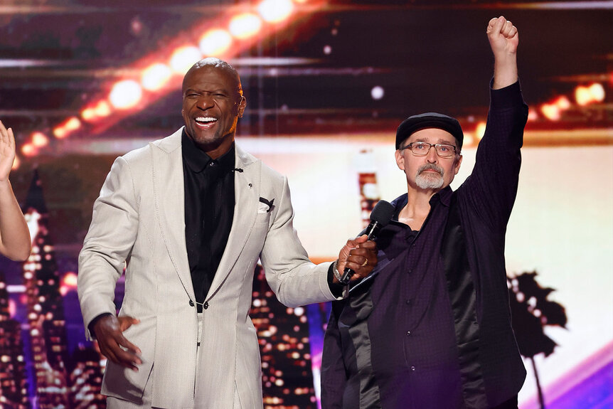 Terry Crews and Richard Goodall onstage in America's Got Talent, Season 19, Episode 10.