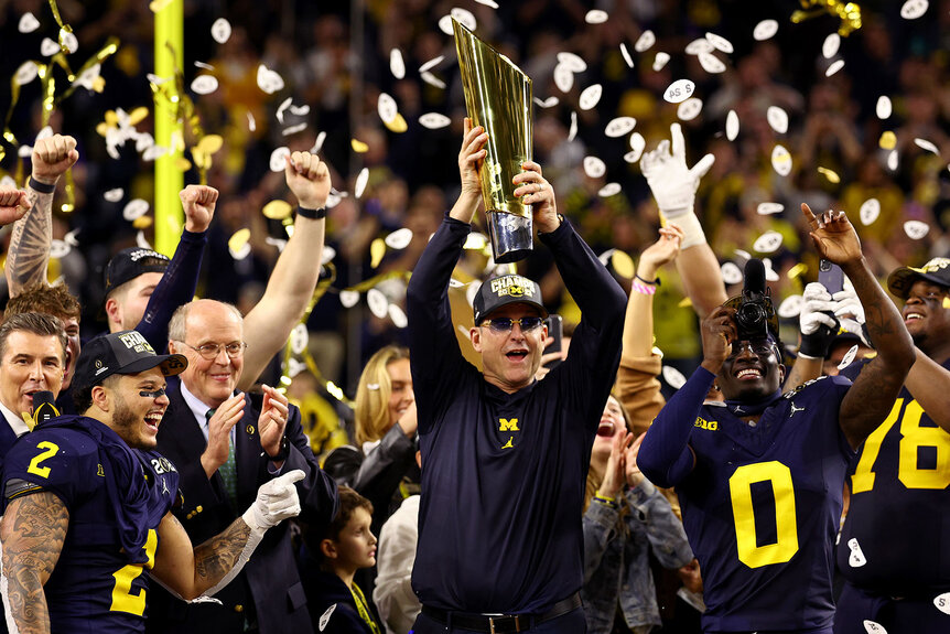 Head coach Jim Harbaugh of the Michigan Wolverines celebrates after defeating the Washington Huskies 34-13 in the 2024 CFP National Championship game