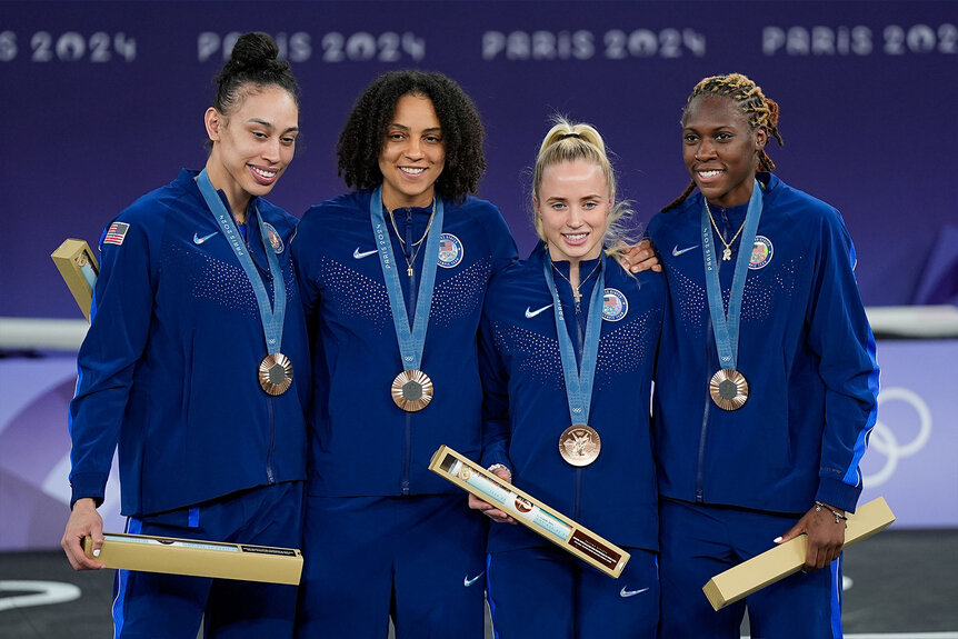 Team United States celebrate their bronze medal win during the Women's 3x3 Basketball at theParis 2024 Olympics