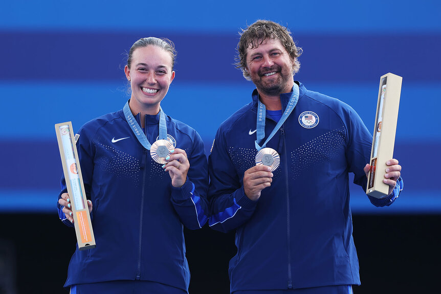 Bronze medalists Casey Kaufhold and Brady Ellison of Team United States pose on the podium during the Archery Mixed Team at the Paris 2024 Olympics