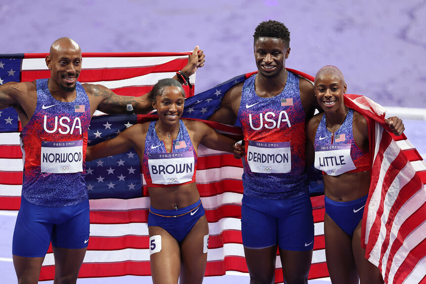 Bryce Deadmon, Vernon Norwood, Kaylyn Brown and Shamier Little of Team United States celebrate winning silver during the 4 x 400m Relay Mixed final