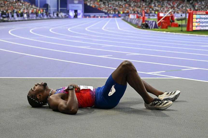 US' Noah Lyles reacts after competing in the men's 200m final at the Paris 2024 Olympics