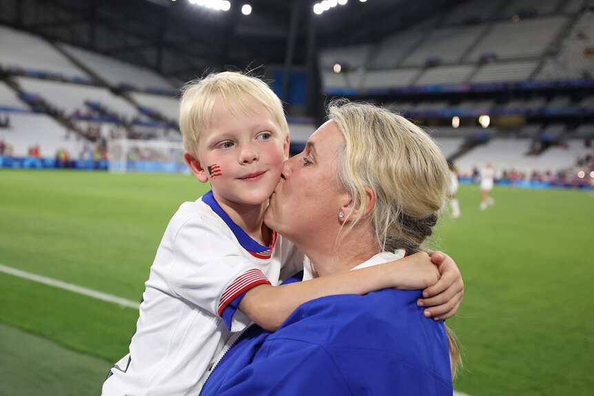 Emma Hayes, Head Coach of Team United States embraces her son Harry after the Women's group B match between United States and Germany during the Olympic Games Paris 2024