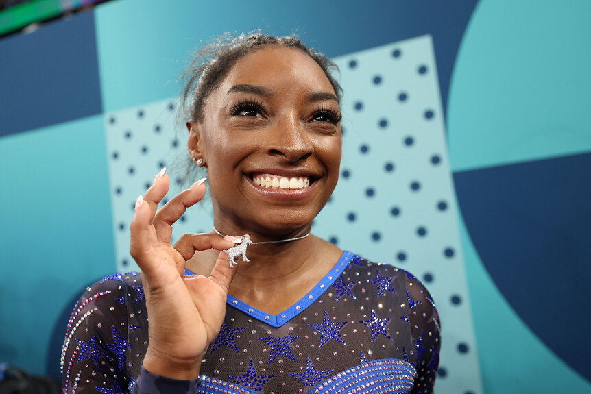 The Message Behind Simone Biles' G.O.A.T. Necklace (PHOTOS) | NBC Insider