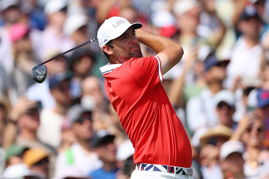 Scottie Scheffler plays a shot in during the men's golf tournament at the 2024 Olympics