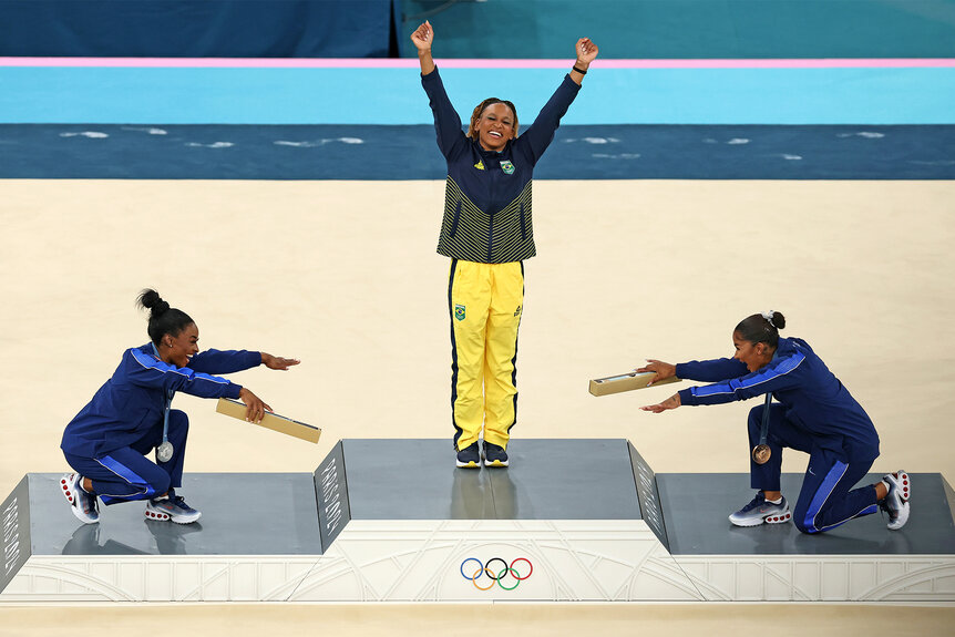 Simone Biles and Jordan Chiles bow down to Rebeca Andrade at the 2024 Olympics