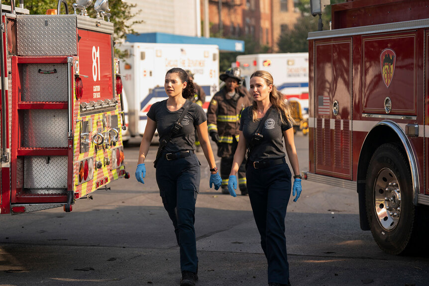 Violet Mikami and Novak take in the scene of a fire