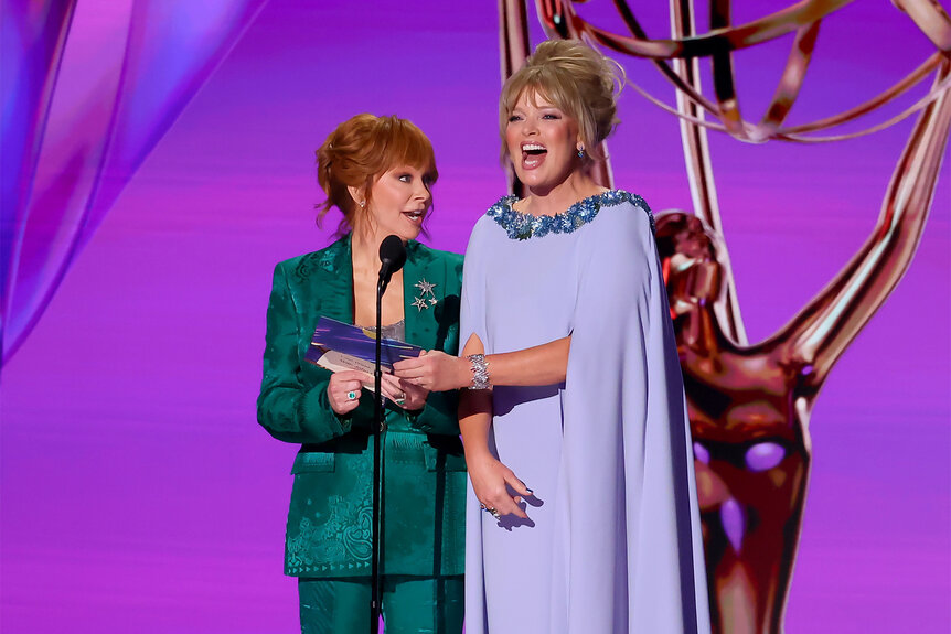 Reba McEntire and Melissa Peterman present together on stage at the 2024 emmy awards