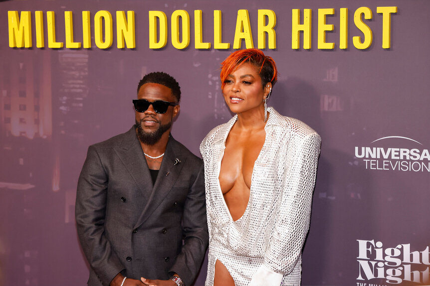 Kevin Hart and Taraji P. Henson pose for a photo at the premiere of Peacock's "Fight Night: The Million Dollar Heist"