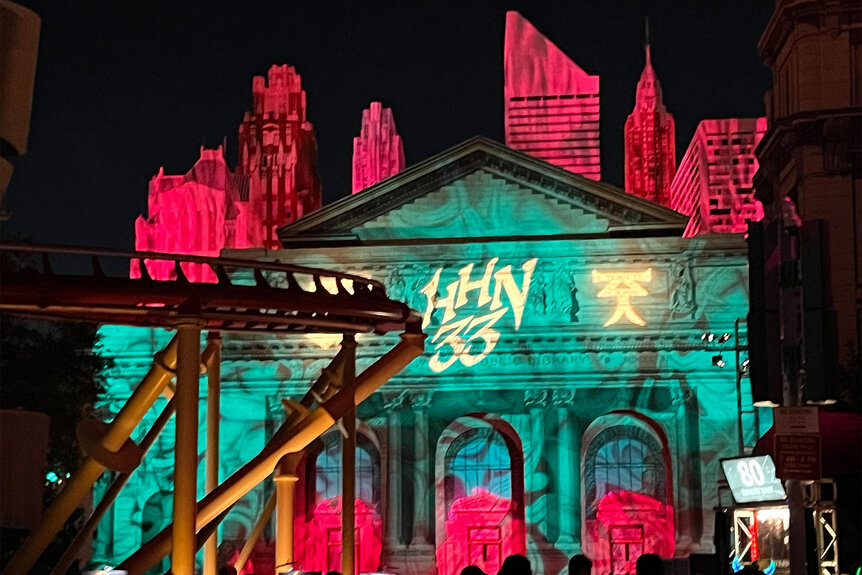 A view of the light show on a building at Halloween Horror Nights at Universal Orlando