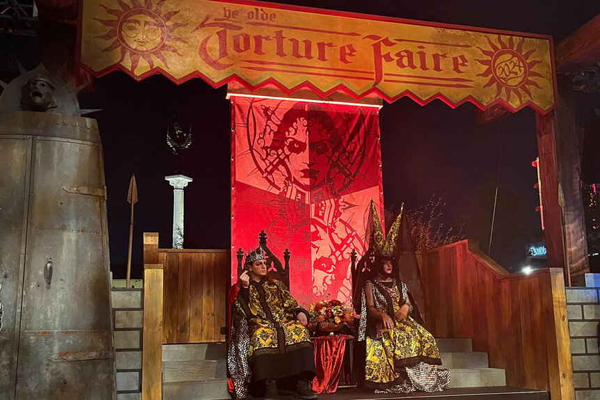 two renaissance people sit on thrones at Halloween Horror Nights